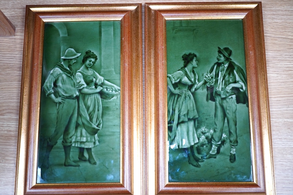 A pair of Craven Dunhill green glazed figurative framed tiles, 29.5cm high, 14cm wide. Condition - good